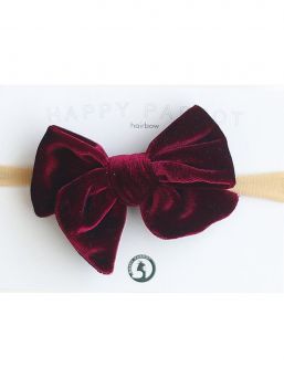 Beautiful and adorable HAPPYPARROT Velvet collection bow headwrap for baby. All bow headwraps are made by hand. The fabrics are soft and the headband does not tighten or squeeze the baby's head.