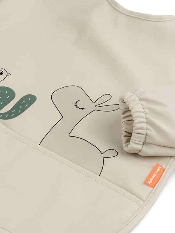 Longsleeve bib from Done by Deer PVC-free coated polyester - durable and practical material.