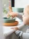 Set a fun table with the Done By Deer Silicone Stick&Stay dinner set and Lalee as a cool companion. The mustard plate, the green bowl and the sand mini mug are decorated with embossed patterns with Lalee, Birdee, festive confetti and tingling cactuses.