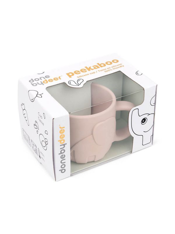 Done by Deer a cute food silicone handle mug stays in the hand of a very small child and is easy to drink.