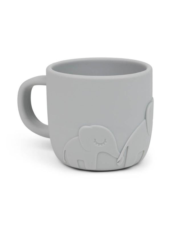 Done by Deer a cute food silicone handle mug stays in the hand of a very small child and is easy to drink.