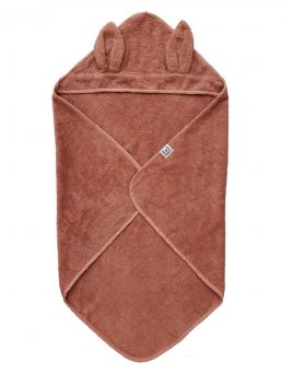 Light-colored hooded towel for babies to shower and bath tubs moments.