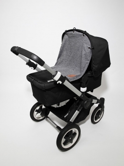 Baby Wallaby´s pram curtain protects sleeping baby from wind and too bright light! 