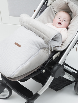 A larger footmuff designed for strollers. The tfootmuff keeps the baby warm for even longer rides and when the child is sleeping on the stroller. The footmuff has a handy zipper that can be easily open and close.  The footmuff has openings for the five-point harness. The footmuff fits perfectly to all the stroller models.
