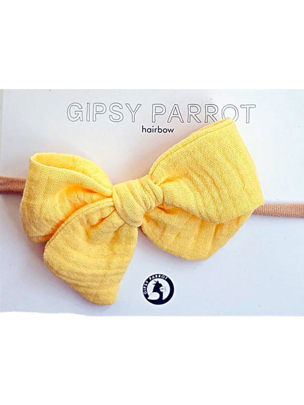 Beautiful and adorable Gipsyparrot Muslin collection bow headwrap for baby. All bow headwraps are made by hand. The fabrics are soft and the headband does not tighten or squeeze the baby's head.