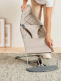 babybjorn-bouncher-bliss-cotton-sand-grey. BabyBjörn Bliss bouncher. Cotton fabric cover that can be easily removed and machine washed. The BabyBjörn Bliss sitter has three positions for use and a folding position for transport and storage.