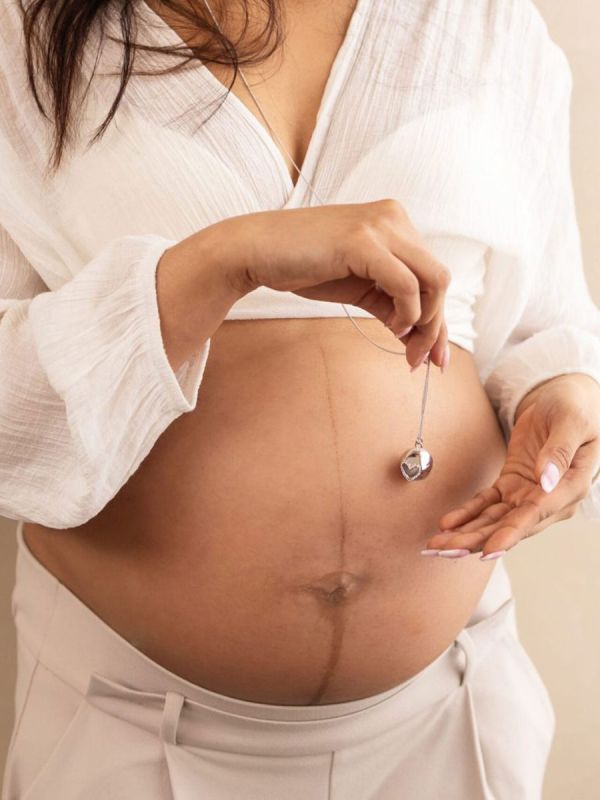 Bola pregnancy necklace – Meaningful jewelry, Lilo bow