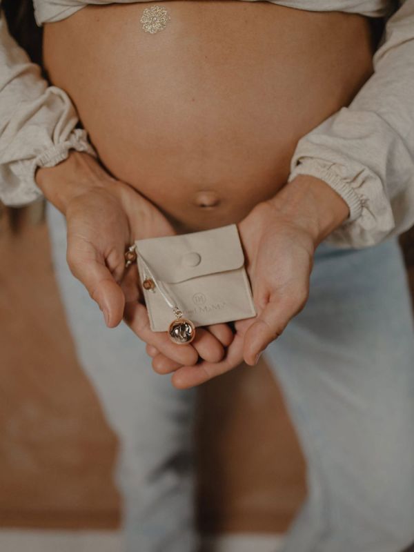 Bola pregnancy necklace – Meaningful jewelry, Lilo bow