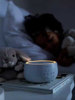 Yogasleep Dreamcenter white noise machine for soothing sounds.