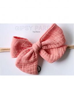 Beautiful and adorable Gipsyparrot Muslin collection bow headwrap for baby. All bow headwraps are made by hand. The fabrics are soft and the headband does not tighten or squeeze the baby's head.