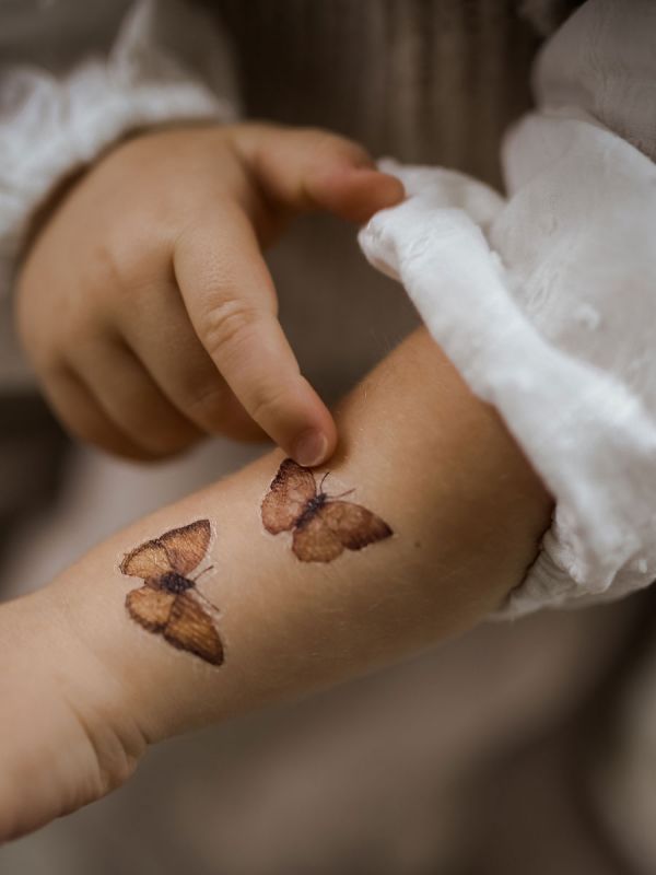 Mrs. Mighetton's children temporary tattoos with cute pictures. Easy and quick to put on.