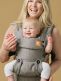 TULA Explore Baby Carrier. Multiple positions to carry baby including front facing out, facing in, and back carry. Each position provides a natural, ergonomic position.