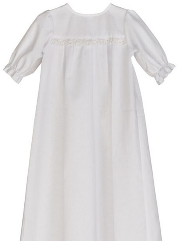 Klione white baby christening dress Kotitie for baptisms, christening or naming parties. The front of the christening dress has a beautiful lace and the back has a buttoning.