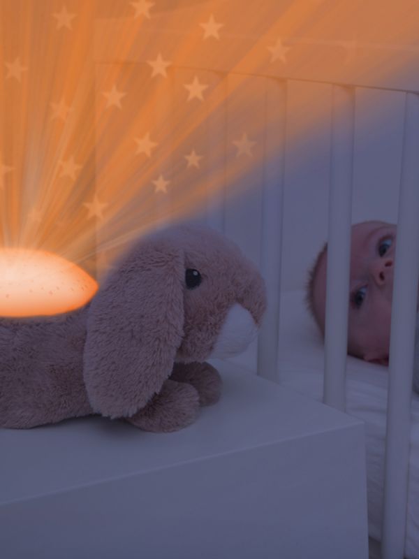 Zazu rabbit Ruby nightlight turns your child's room into a magical starry sky while playing soothing melodies.