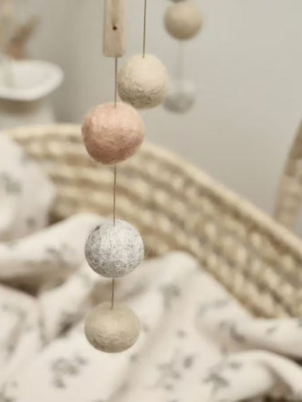 ILADO Harmony Ball mobile for baby. A timelessly beautiful Harmony Ball hanging mobile that you can place over your baby's crib or diaper change point.