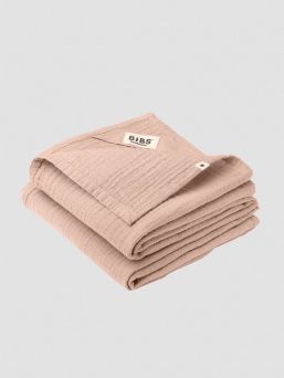 BIBS Muslin cloth is premium GOTS certified multifunctional baby cloth that can be used as a burp cloth, nursing cover, a cover on your changing mat, or as a bib.