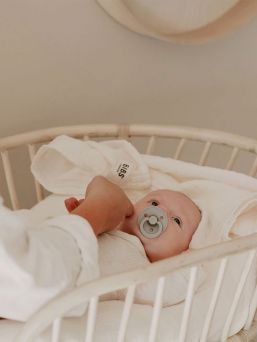 BIBS Muslin cloth is premium GOTS certified multifunctional baby cloth that can be used as a burp cloth, nursing cover, a cover on your changing mat, or as a bib.