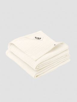 BIBS Muslin cloth is premium GOTS certified multifunctional baby cloth that can be used as a burp cloth, nursing cover, a cover on your changing mat, or as a bib.