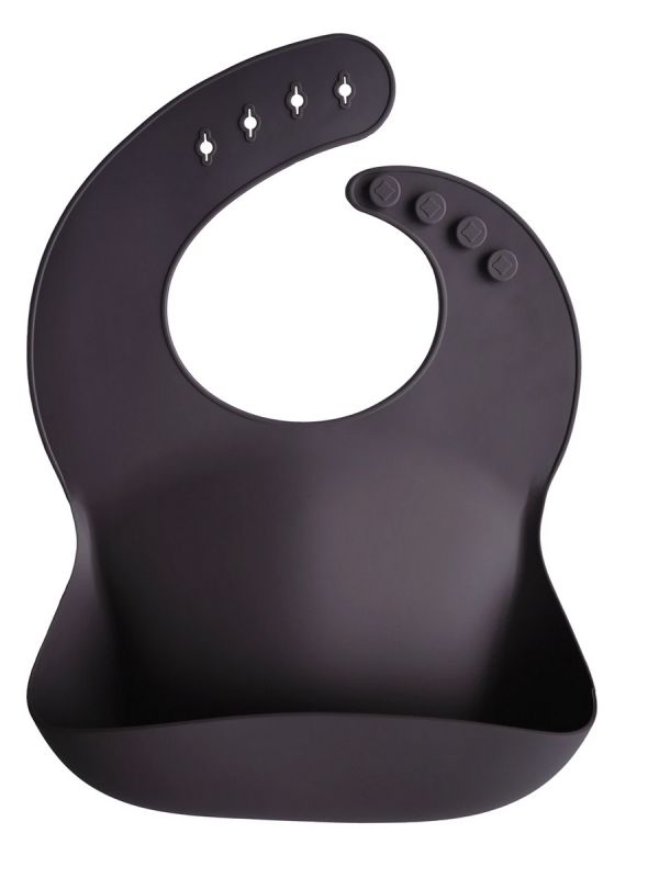 Mushie silicone bib is classic and timeless. Easy to clean and you can roll it along the way.