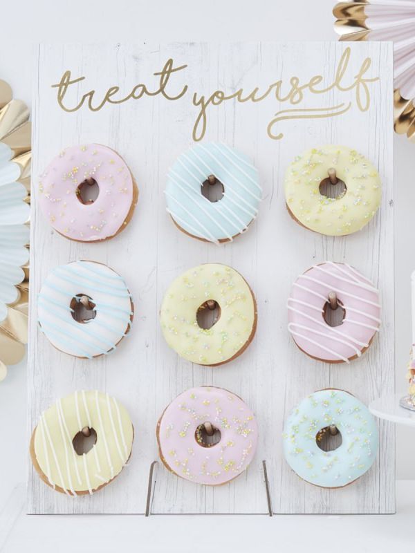 Ginger Ray Treat Yourself Donut Wall. Guests will adore this cute finishing touch to your celebrations as they help themselves to delicious donuts.