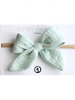 Beautiful and adorable Gipsyparrot Muslin collection bow headwrap for baby. All bow headwraps are made by hand. The fabrics are soft and the headband does not tighten or squeeze the baby's head.