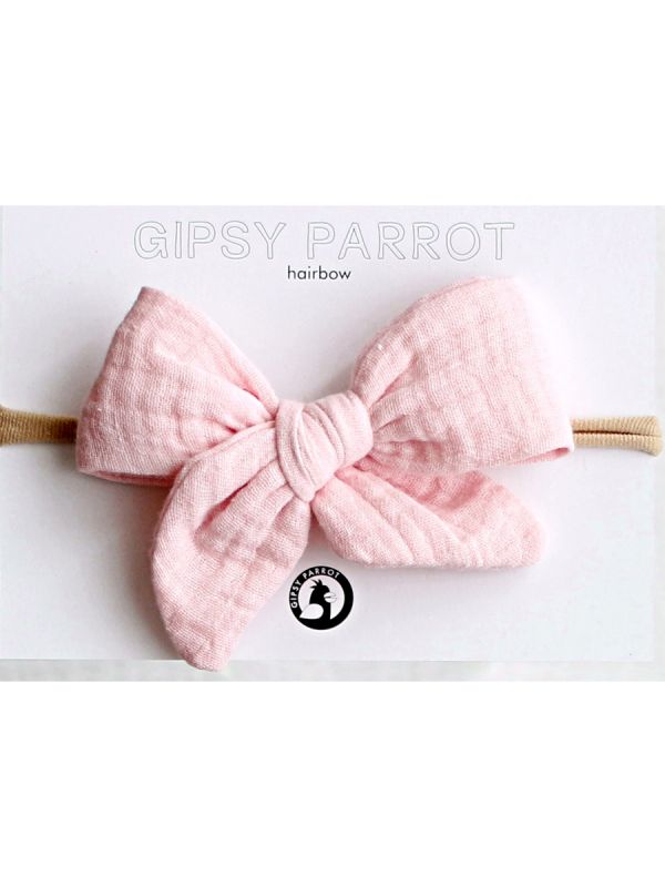 Beautiful and adorable Gipsyparrot Muslin collection bow headwrap for baby. All bow headwraps are made by hand. The fabrics are soft and the headband does not tighten or squeeze the baby's head.