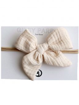 Beautiful and adorable Gipsyparrot Muslin collection bow headwrap for baby. All bow headwraps are made by hand. The fabrics are soft and the headband does not tighten or squeeze the baby's head.