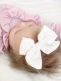 Beautiful and adorable Gipsyparrot Muslin collection bow headwrap for baby. All bow headwraps are made by hand. The fabrics are soft and the headband does not tighten or squeeze the baby's head.