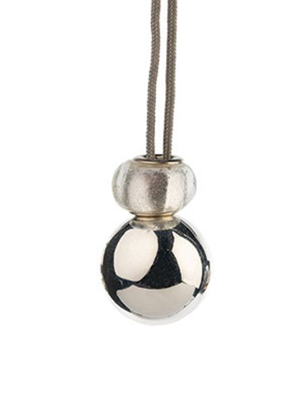 Beautiful handcrafted musical maternity chime for mum-to-be to wear as necklace, with the chime resting low on her belly. A soft sound is made when she walks or moves.
