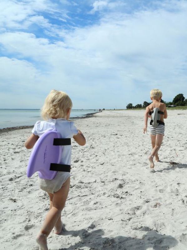 The Swimfin Shark Fin for Children learning to swim, a safety swimming aid and flotation device.