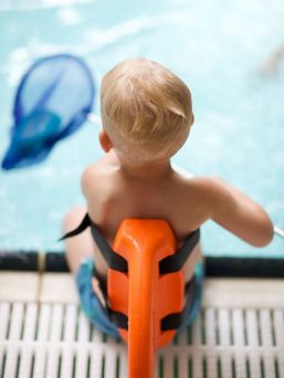 The Swimfin Shark Fin for Children learning to swim, a safety swimming aid and flotation device.