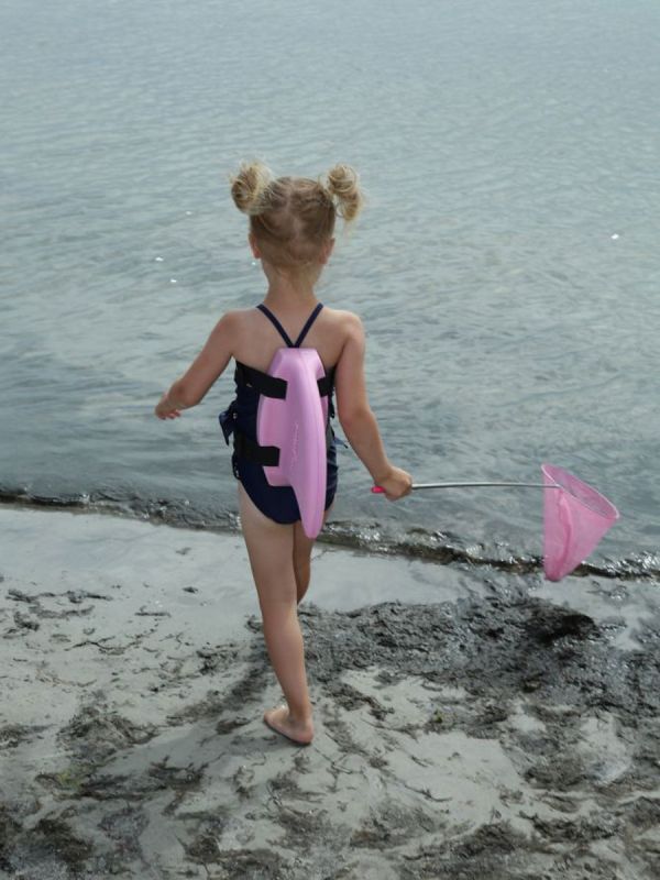The Swimfin Shark Fin for Children learning to swim, a safety swimming aid and flotation device.