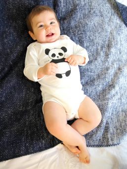 Soft and comfortable Kurtis Baby Peace baby long-sleeved body with Panda pattern.