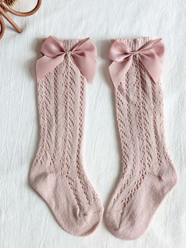 Beautiful baby cotton sock with a wonderful lace pattern and bow.